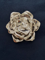 Vintage Dior rose brooch worn as timeless elegant statement accessory
