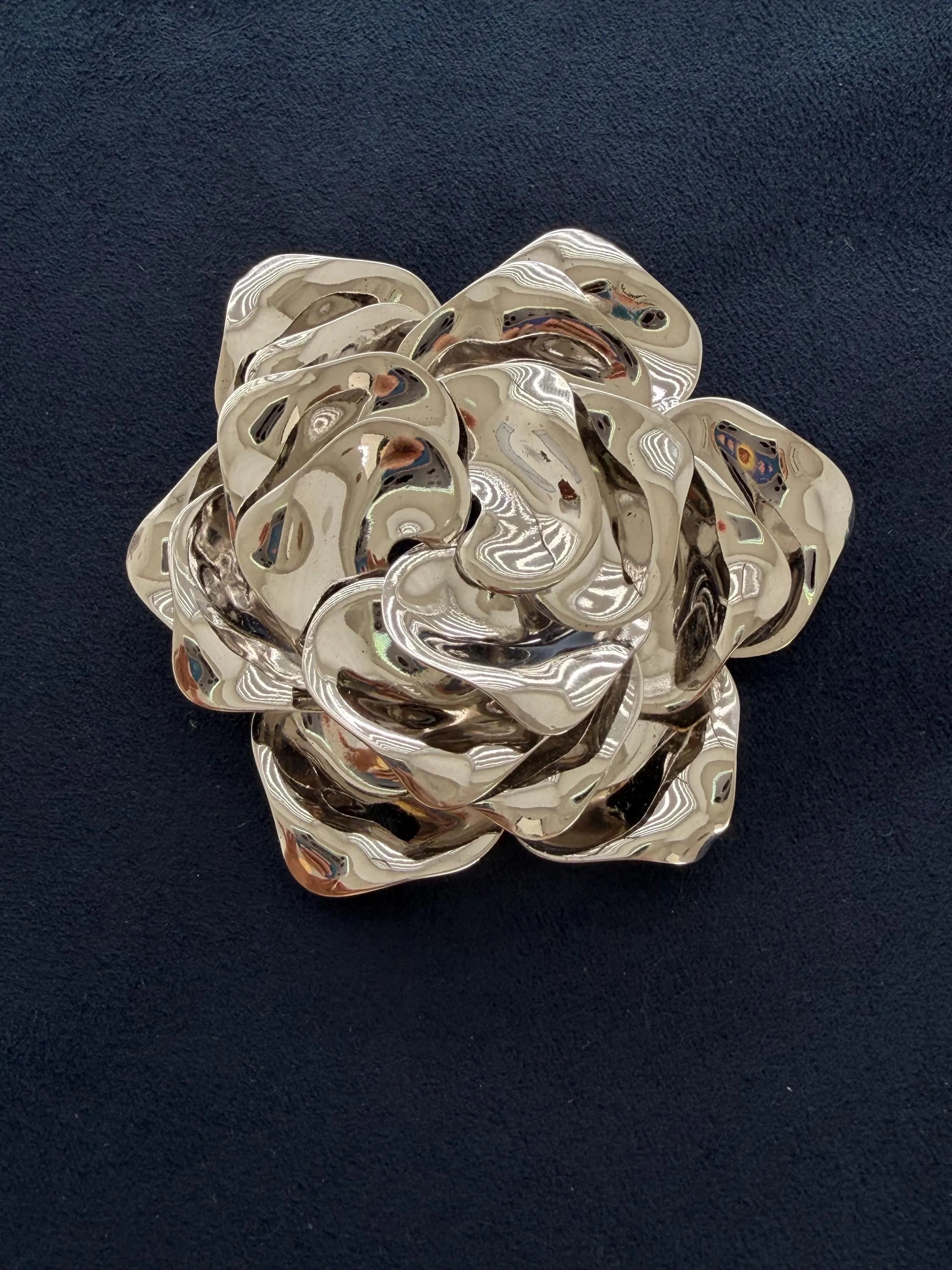 Vintage Dior rose brooch worn as timeless elegant statement accessory