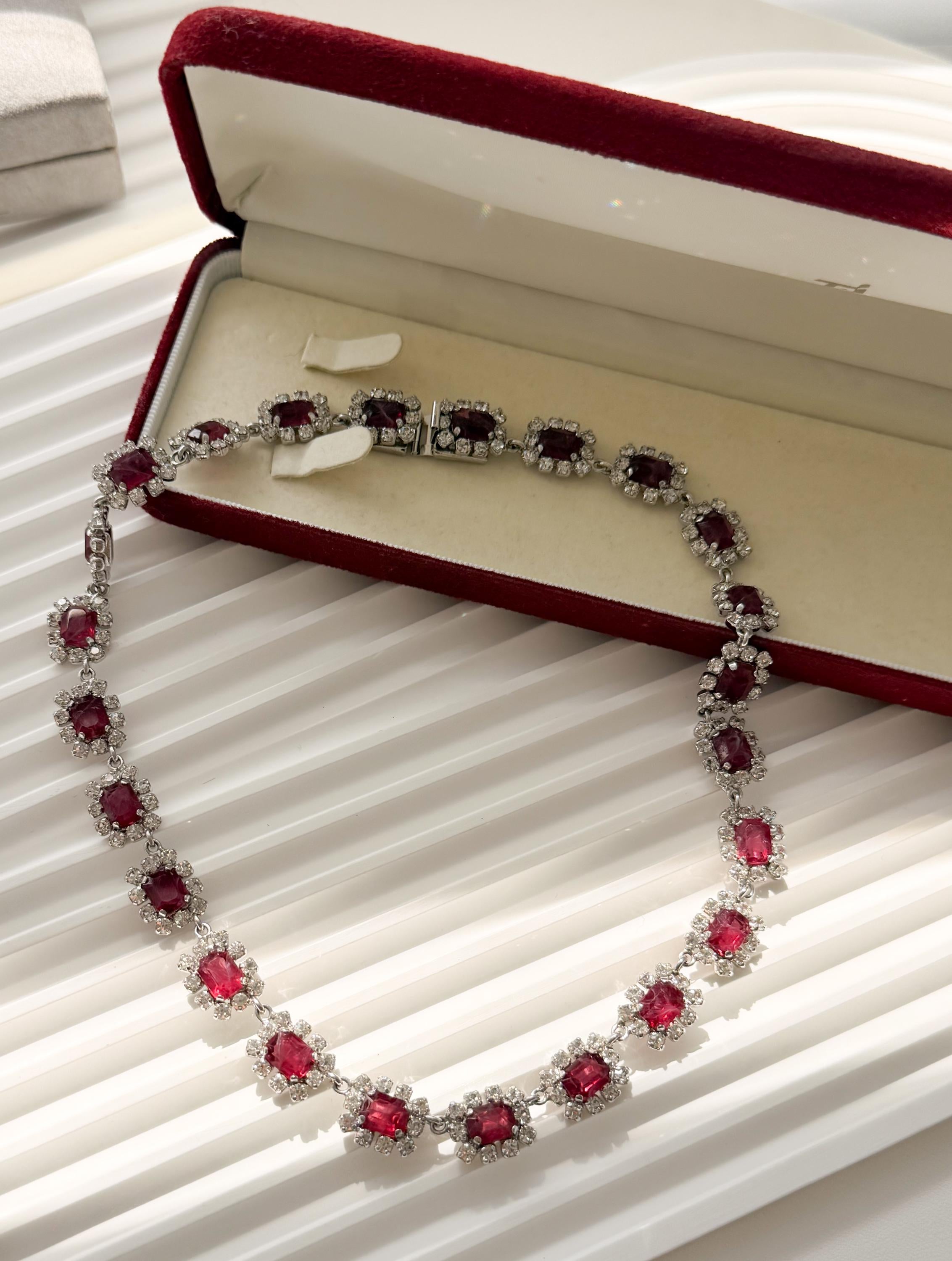 Vintage Dior necklace with luminous ruby crystals and refined silver tone setting