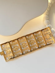 Vintage Givenchy gold tone chunky bracelet with iconic G logo monogram