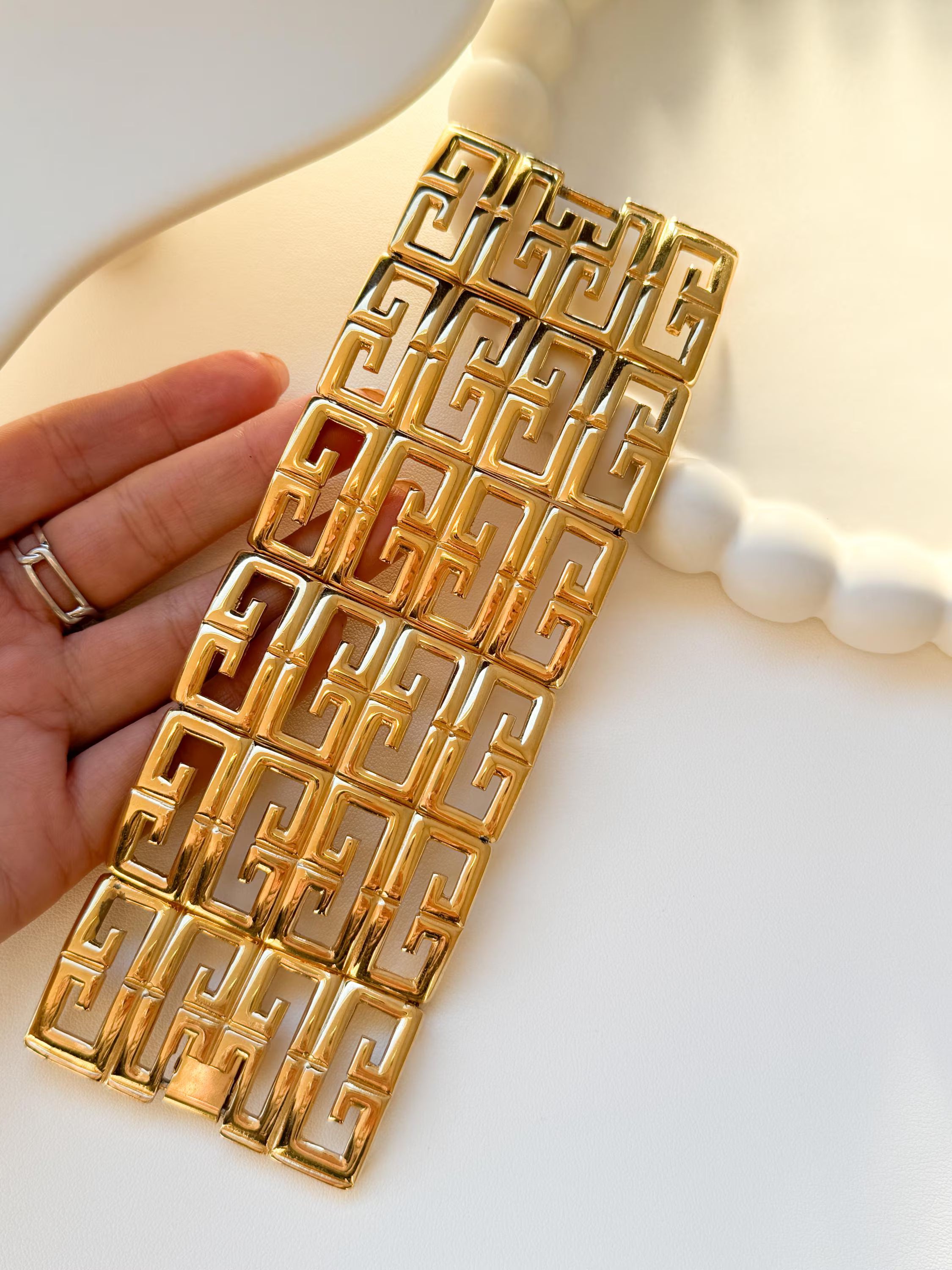 Vintage Givenchy gold tone chunky bracelet with iconic G logo monogram