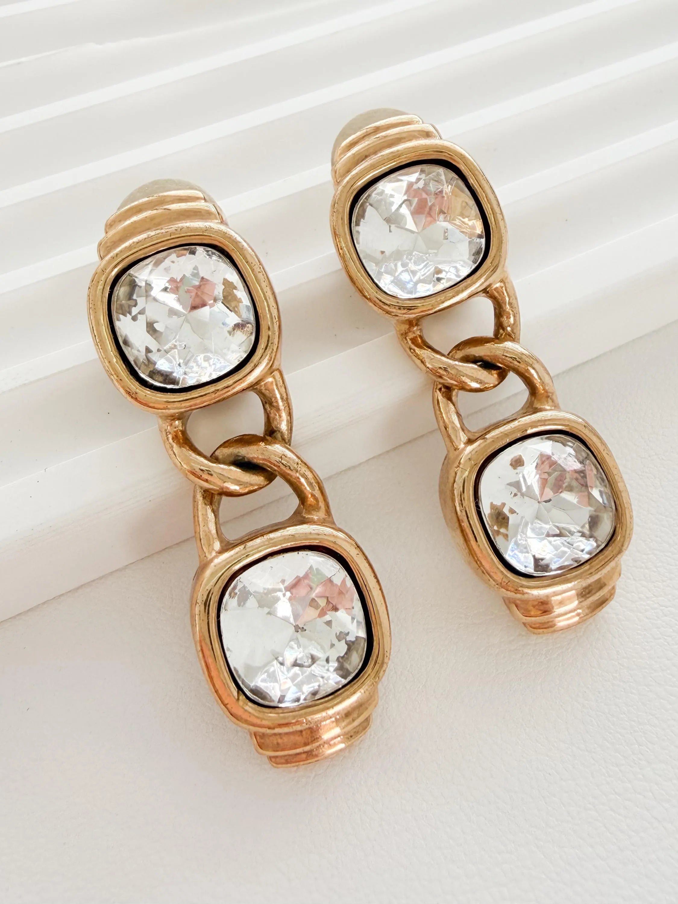 Vintage Givenchy linked dangle earrings with fluid crystal movement
