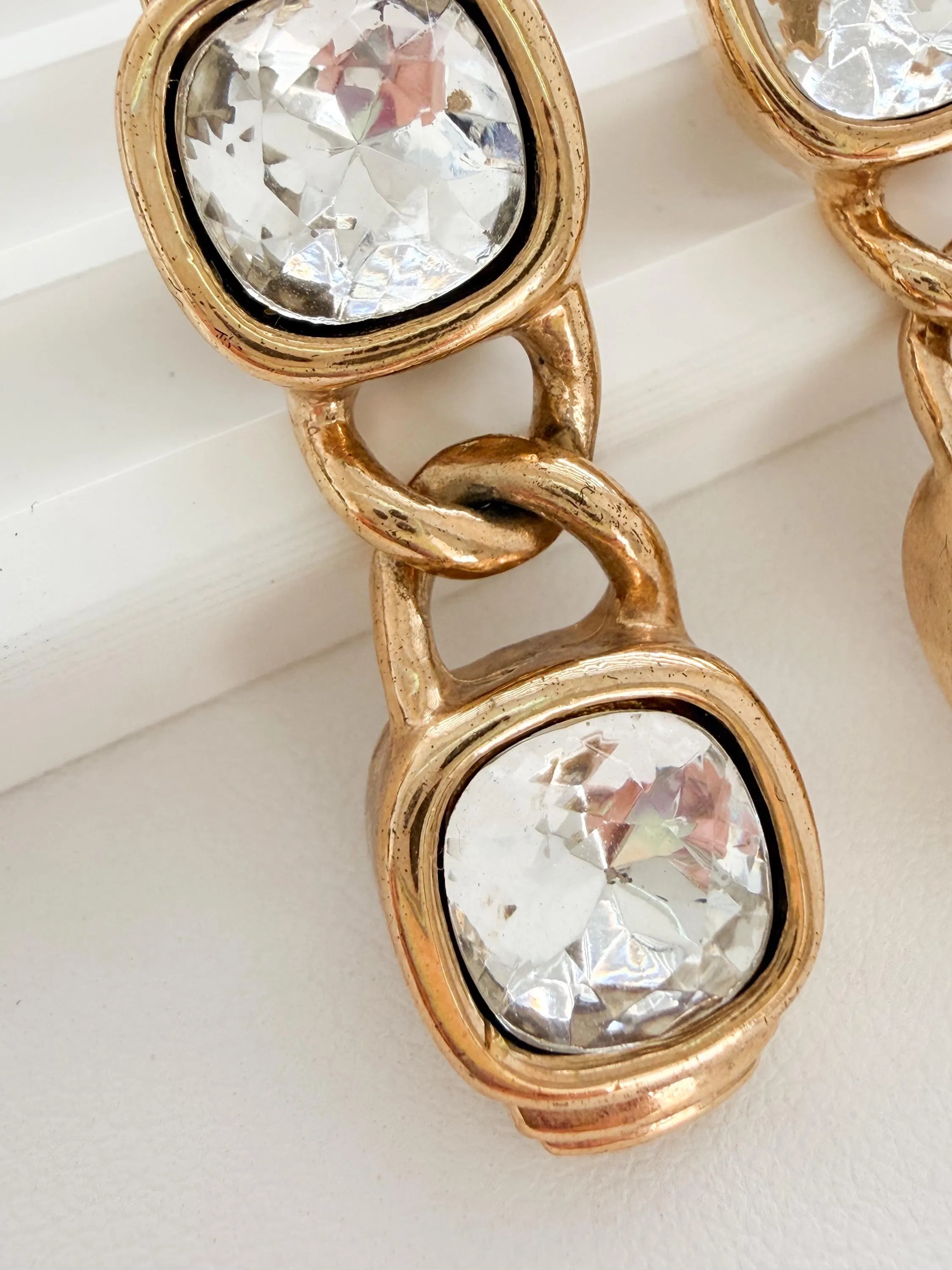 Vintage Givenchy crystal earrings worn as luxury statement piece