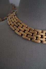 Close-up of Vintage Givenchy gold plated articulated link choker necklace