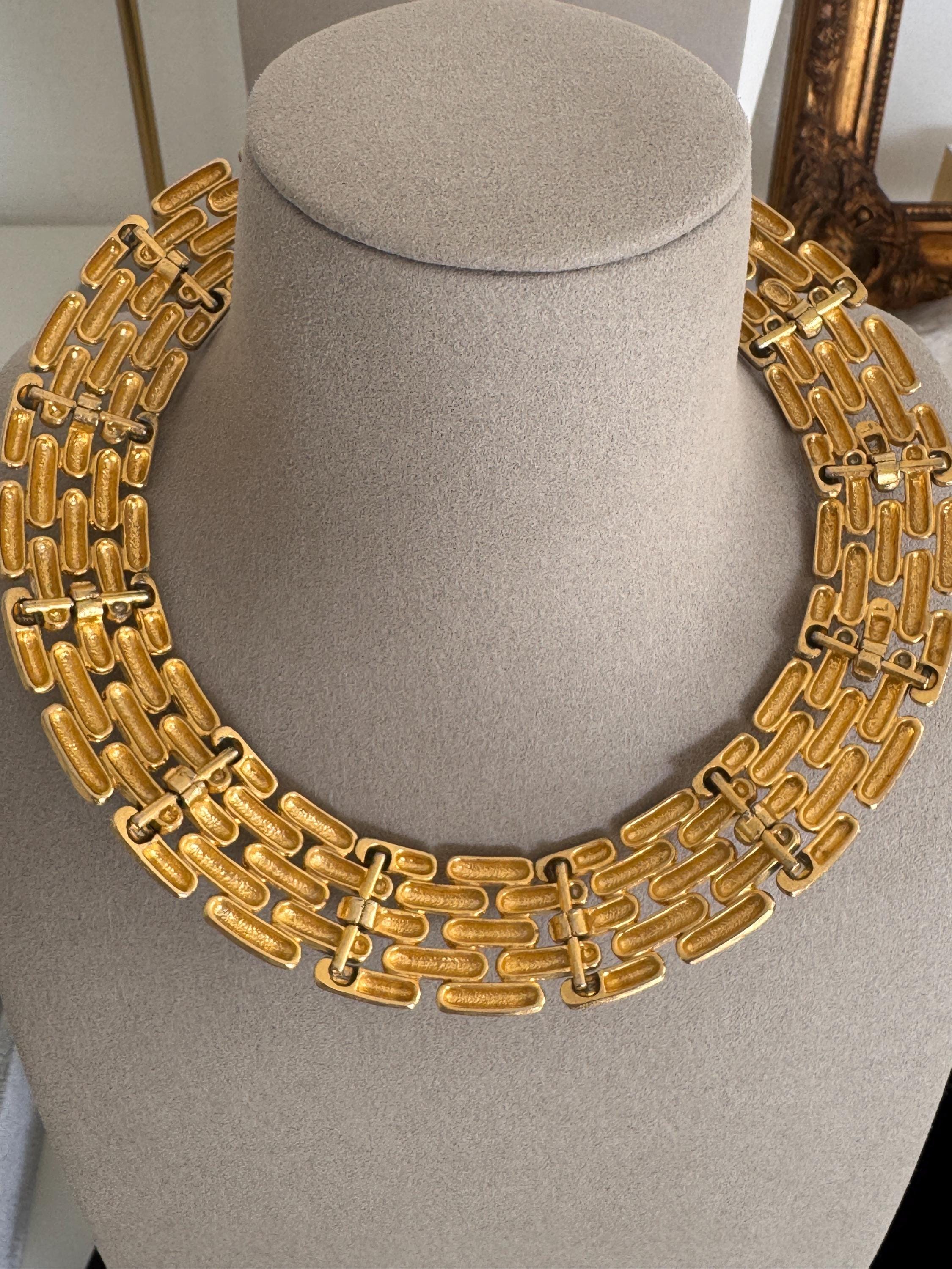 Close-up of Vintage Givenchy gold plated articulated link choker necklace