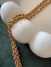 Close-up of Givenchy heart pendant on vintage Paris New York choker necklace