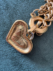Close-up of Givenchy heart pendant on vintage Paris New York choker necklace