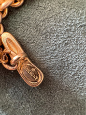 Close-up of Givenchy heart pendant on vintage Paris New York choker necklace