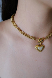 Vintage Givenchy chunky heart pendant choker necklace worn as statement jewelry