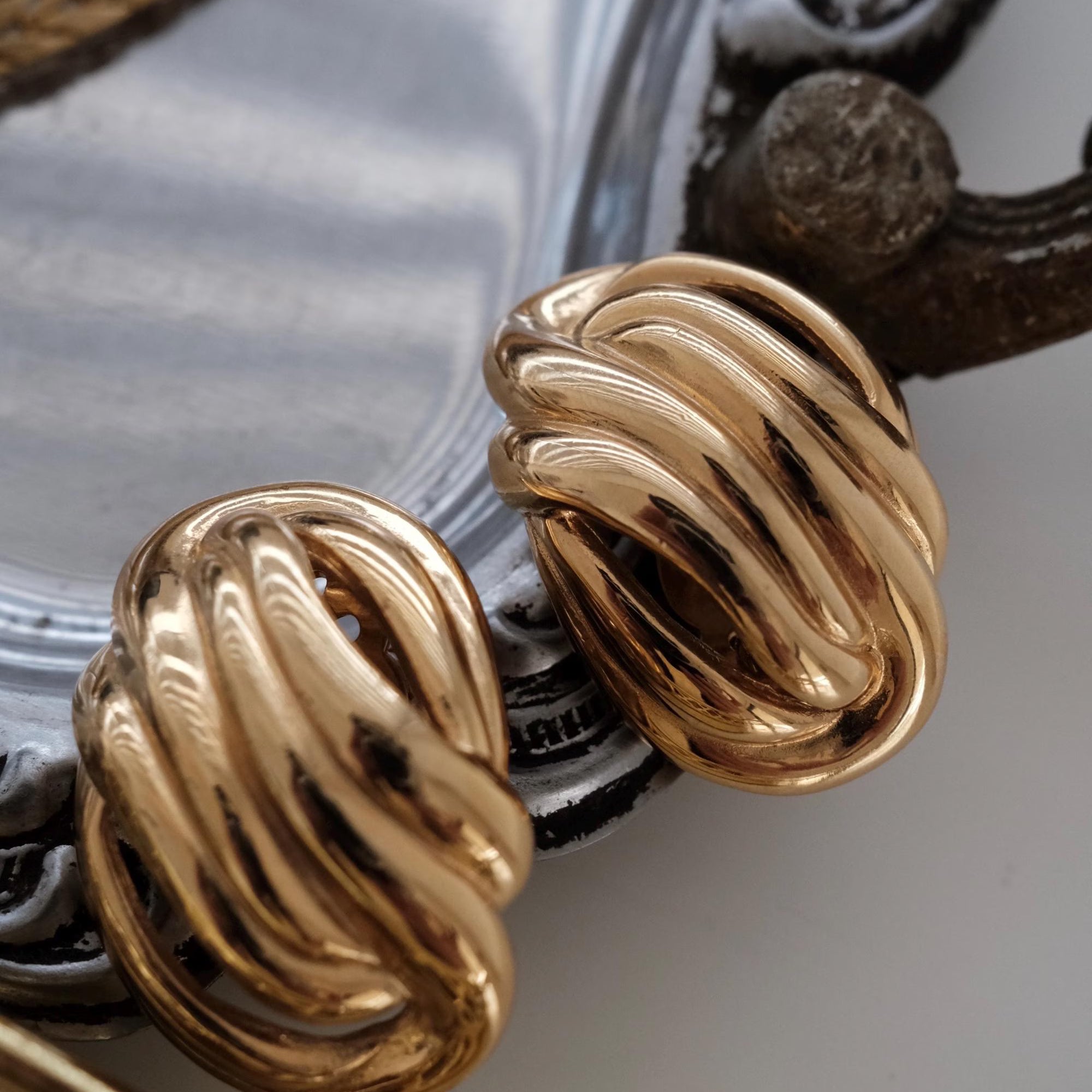 Vintage Givenchy Paris New York knot openwork clip-on earrings in gold tone