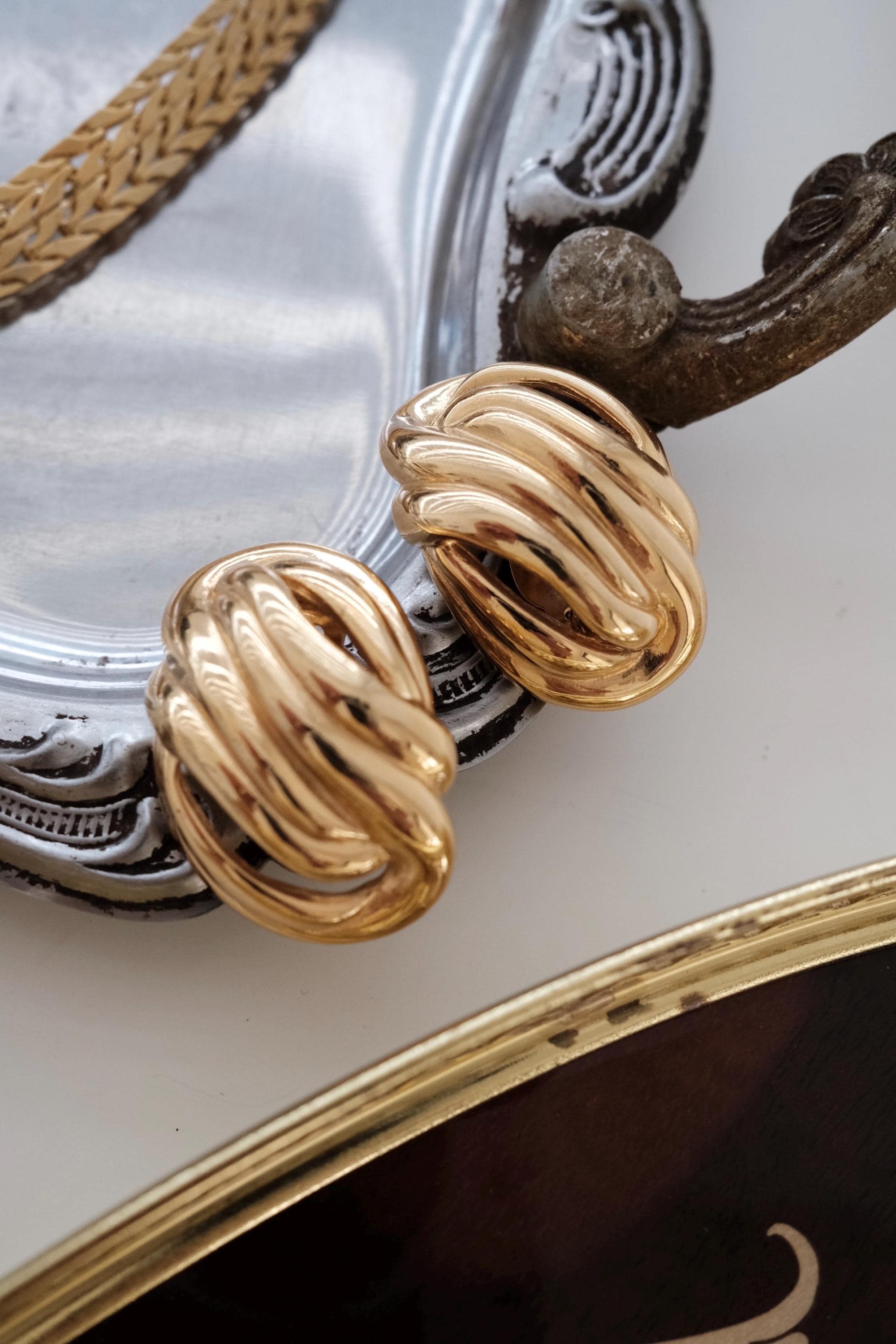 Vintage Givenchy gold tone knot openwork clip-on earrings elegant design