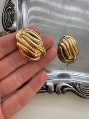 Vintage Givenchy knot openwork clip-on earrings worn as elegant statement jewelry