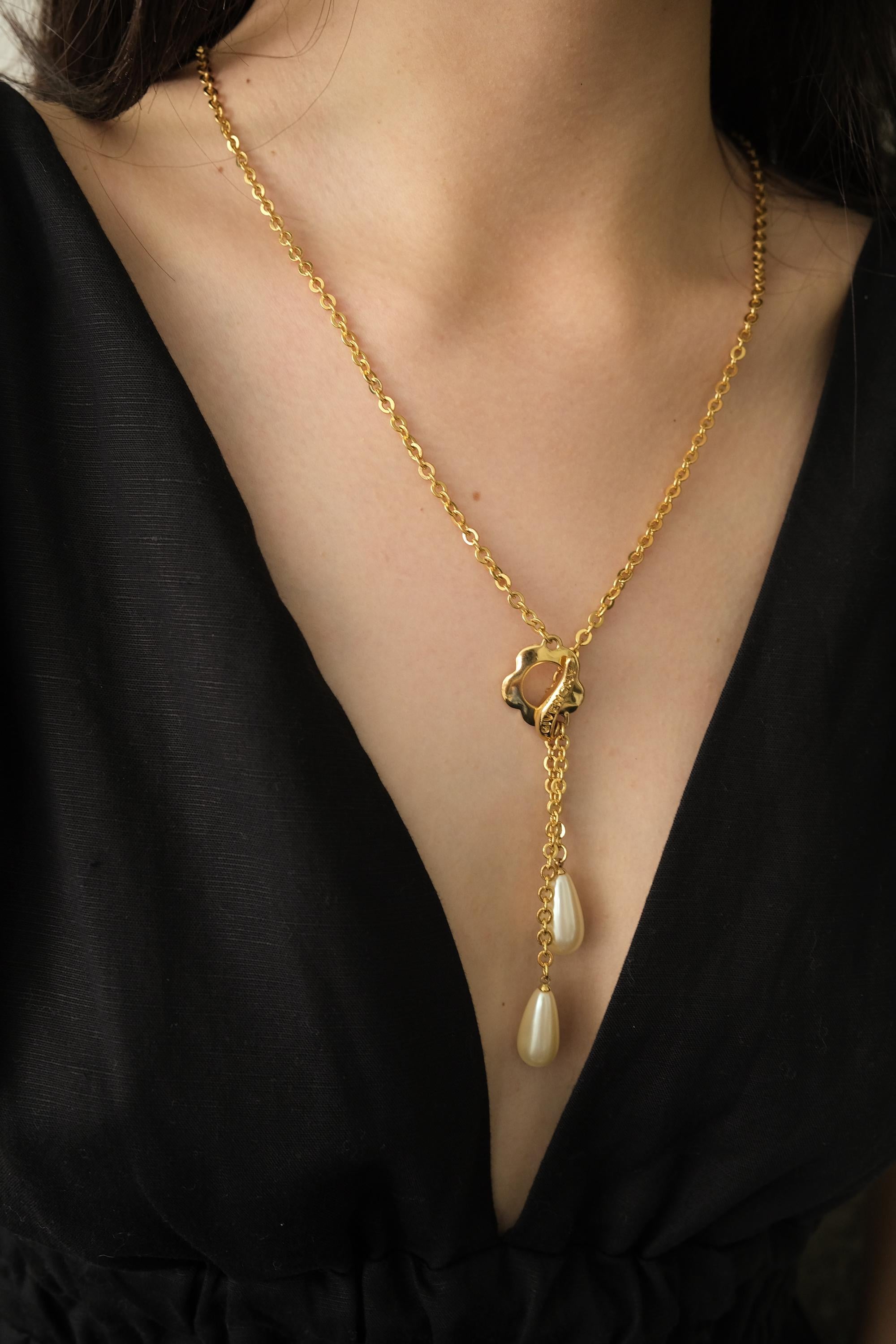 vintage-givenchy-gold-charm-necklace-leaf-pearl-heart-toggle-front.jpg