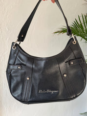 Vintage Salvatore Ferragamo black leather shoulder bag made in Italy, classic structured design, elegant 1980s luxury handbag