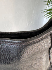 Vintage Salvatore Ferragamo black leather shoulder bag made in Italy, classic structured design, elegant 1980s luxury handbag