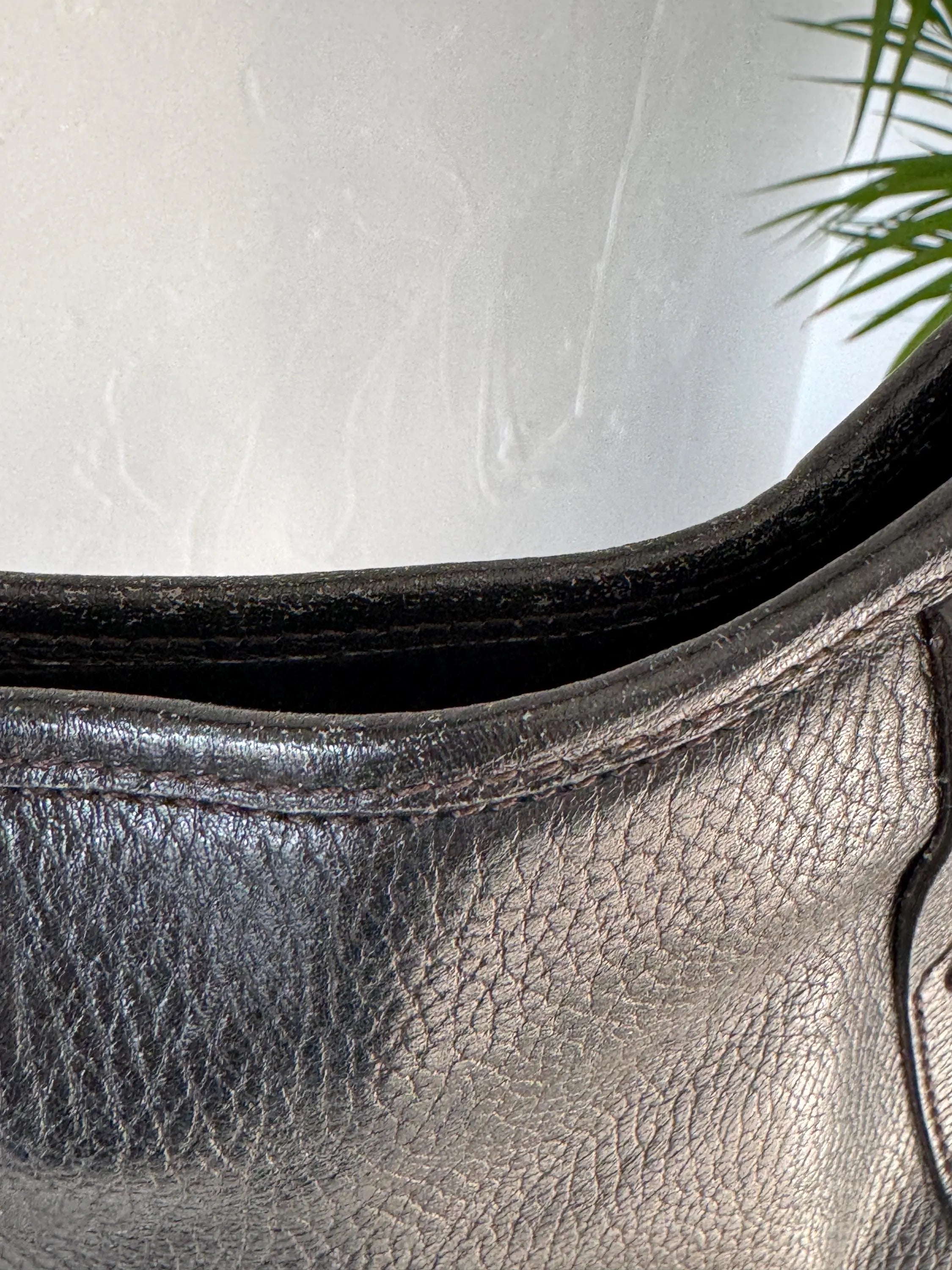 Vintage Salvatore Ferragamo black leather shoulder bag made in Italy, classic structured design, elegant 1980s luxury handbag