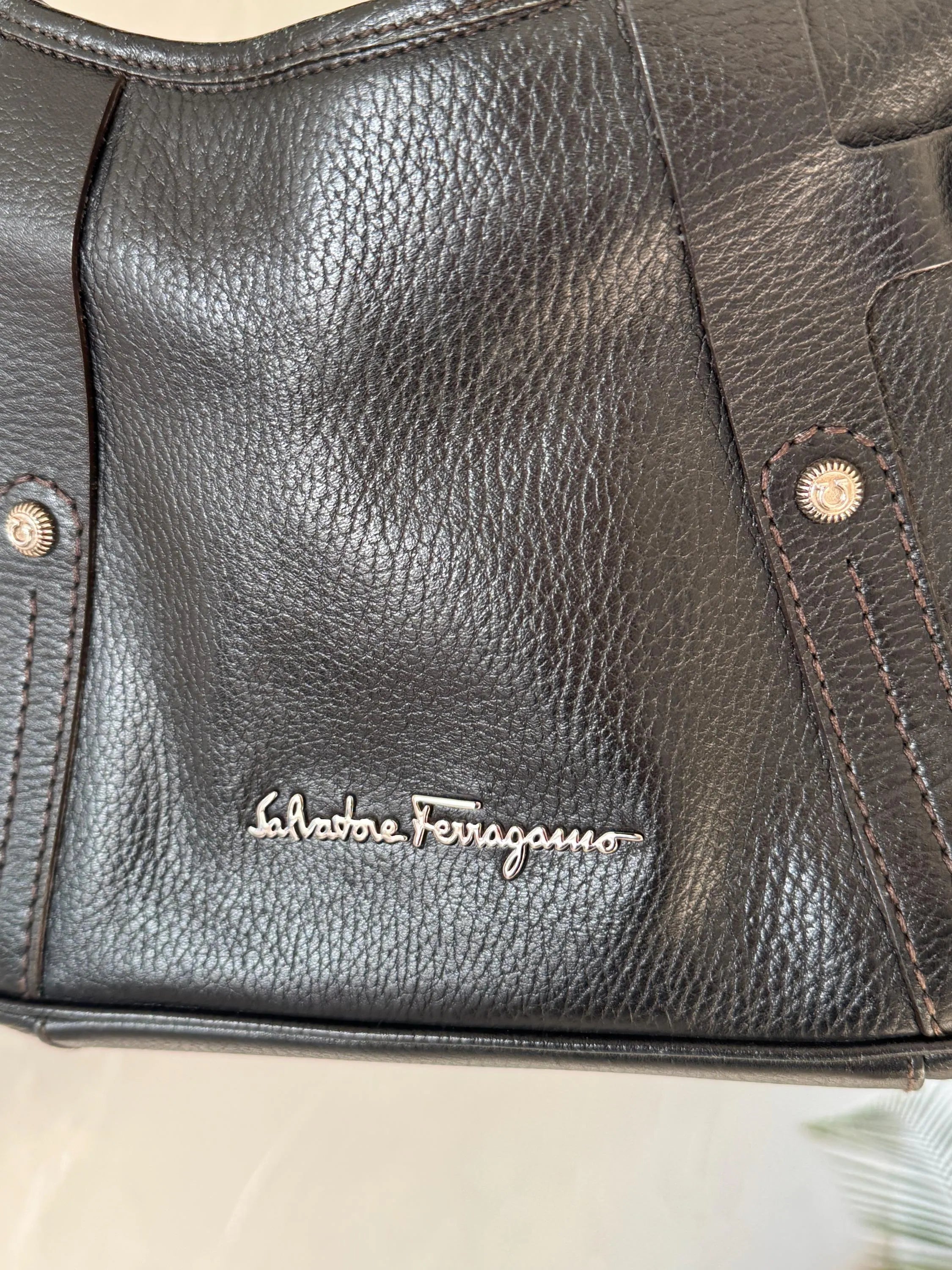 Vintage Salvatore Ferragamo black leather shoulder bag made in Italy, classic structured design, elegant 1980s luxury handbag