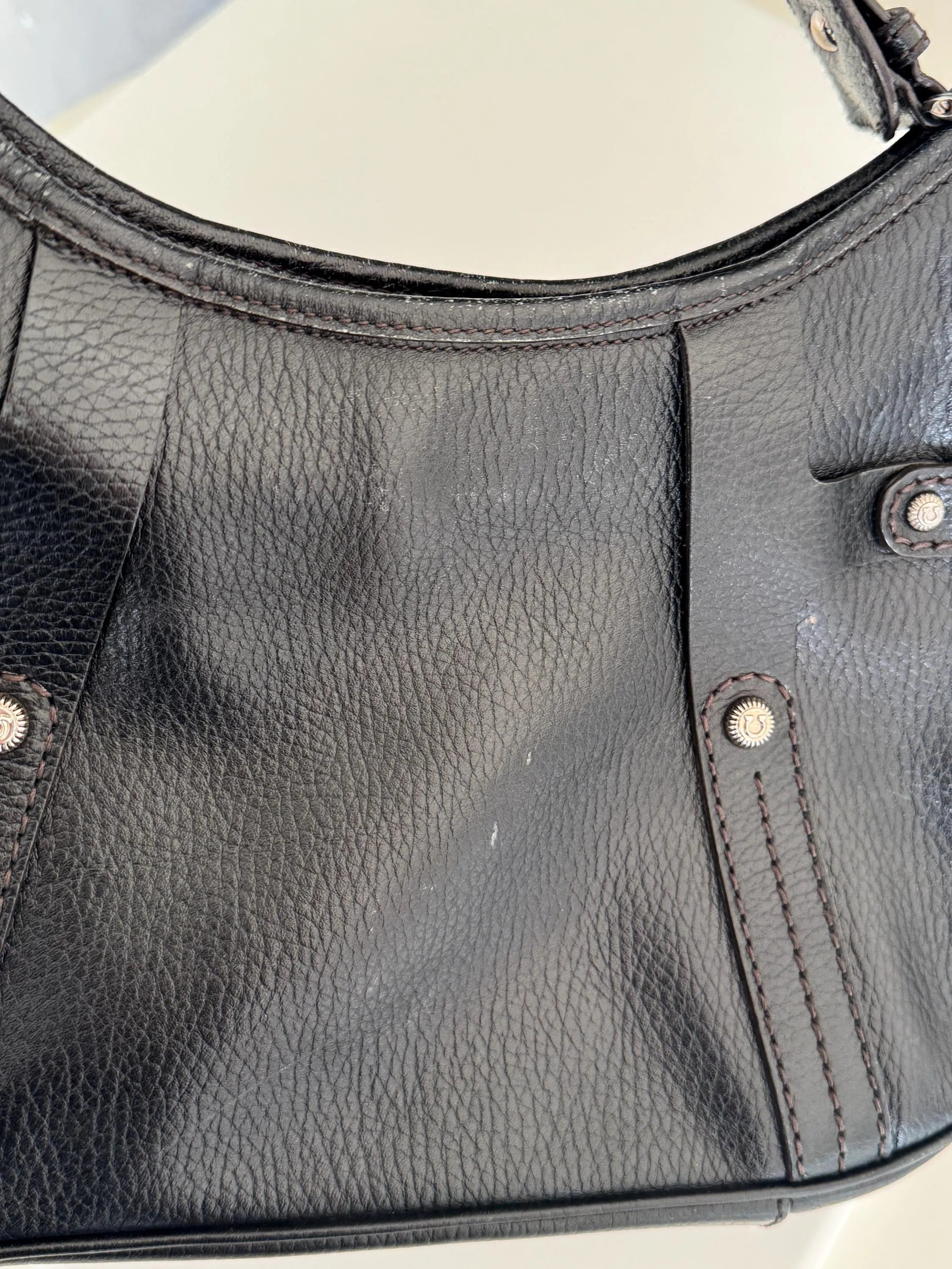 Vintage Salvatore Ferragamo black leather shoulder bag made in Italy, classic structured design, elegant 1980s luxury handbag