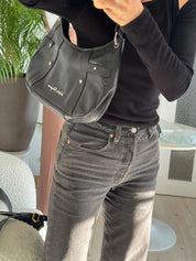 Vintage Salvatore Ferragamo black leather shoulder bag made in Italy, classic structured design, elegant 1980s luxury handbag