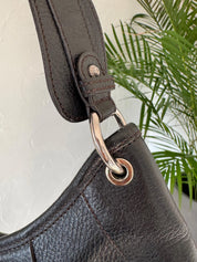 Vintage Salvatore Ferragamo black leather shoulder bag made in Italy, classic structured design, elegant 1980s luxury handbag