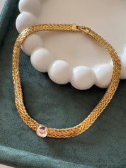 Rare vintage Avon gold tone choker with crystal rhinestones, refined collectible jewelry with investment appeal