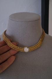 Rare vintage Avon gold tone choker with crystal rhinestones, refined collectible jewelry with investment appeal