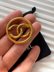 Vintage Chanel gold CC logo brooch, classic couture piece with heirloom appeal