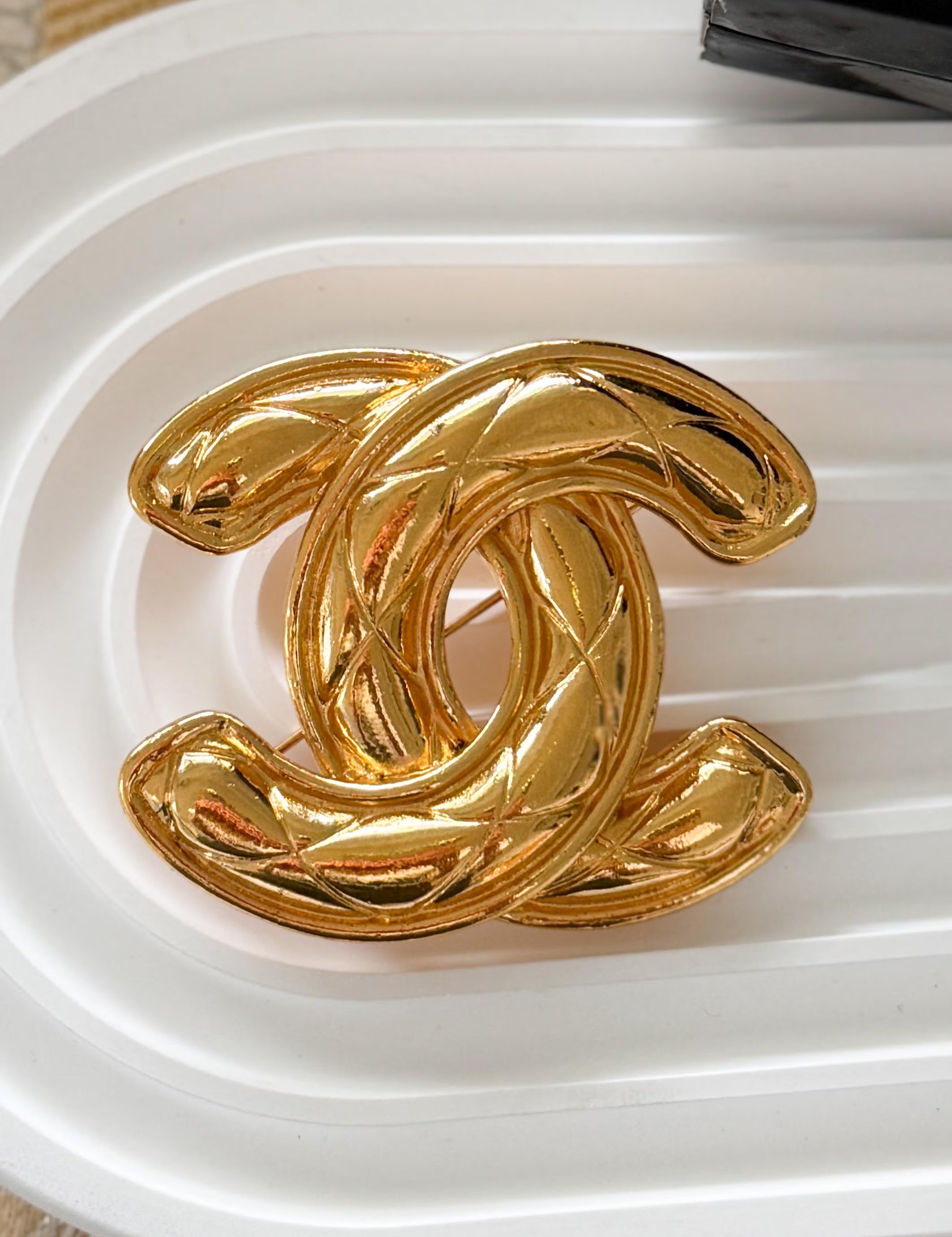 Authentic vintage Chanel gold CC logo quilted brooch, iconic French luxury statement piece