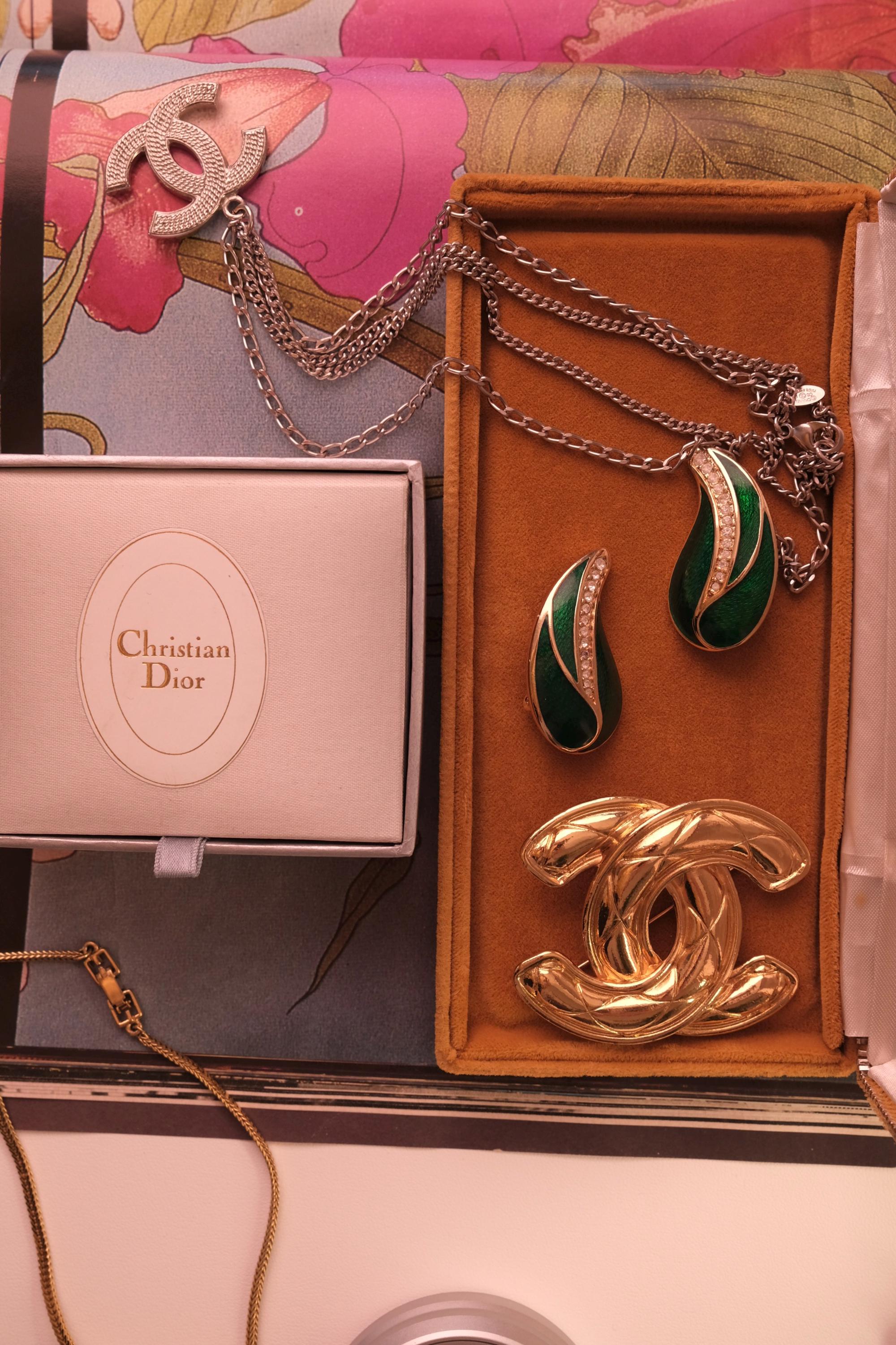 Vintage Chanel gold interlocking CC brooch, refined Paris luxury designer jewelry