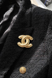 Rare vintage Chanel gold CC logo brooch, collectible French luxury accessory
