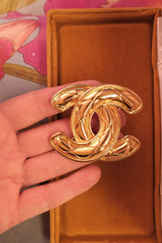 Rare vintage Chanel gold CC logo brooch, collectible French luxury accessory