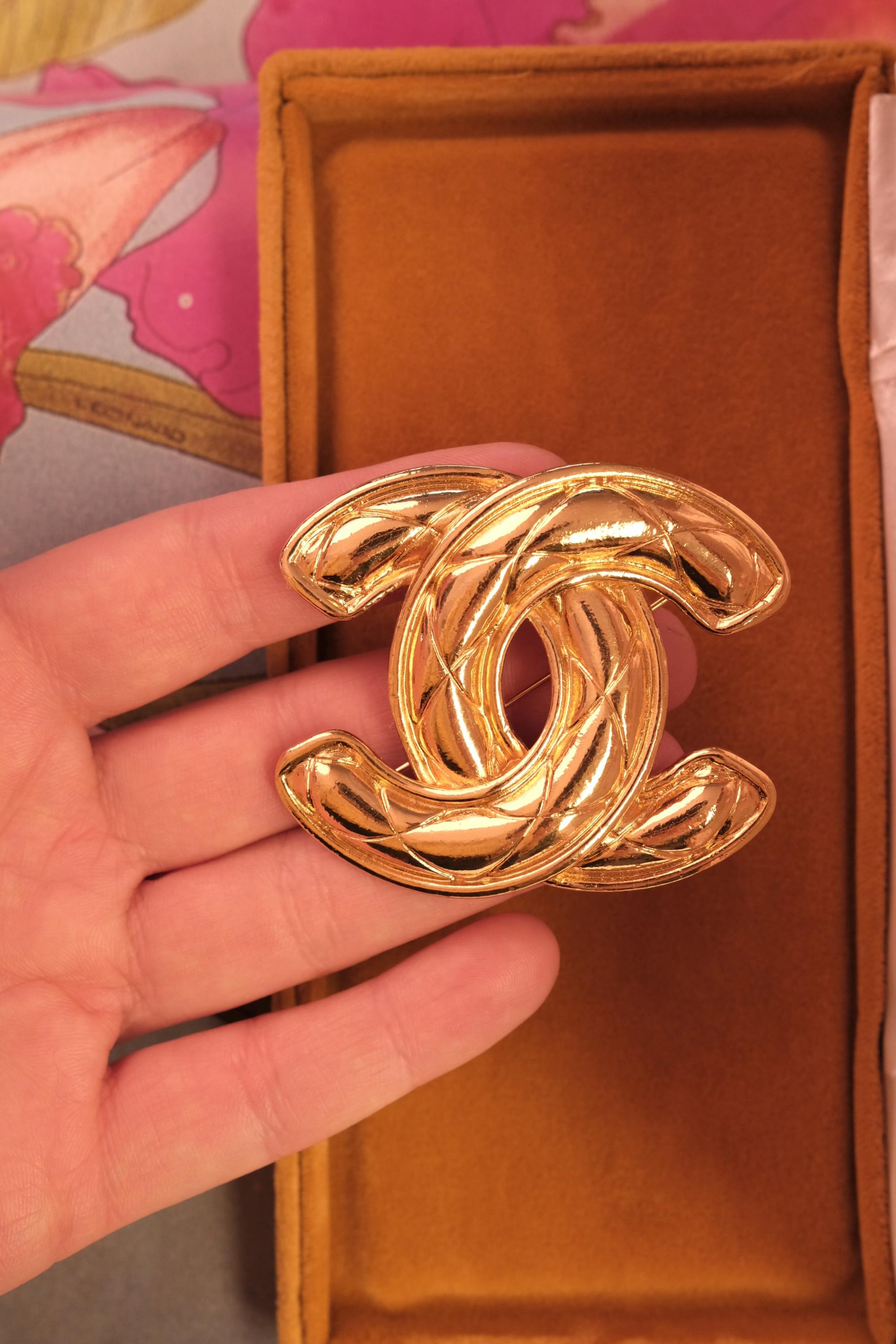 Rare vintage Chanel gold CC logo brooch, collectible French luxury accessory