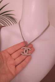 Vintage Chanel silver CC logo necklace, elegant Paris designer jewelry with timeless style