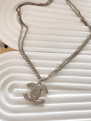 Vintage Chanel silver CC logo necklace, elegant Paris designer jewelry with timeless style