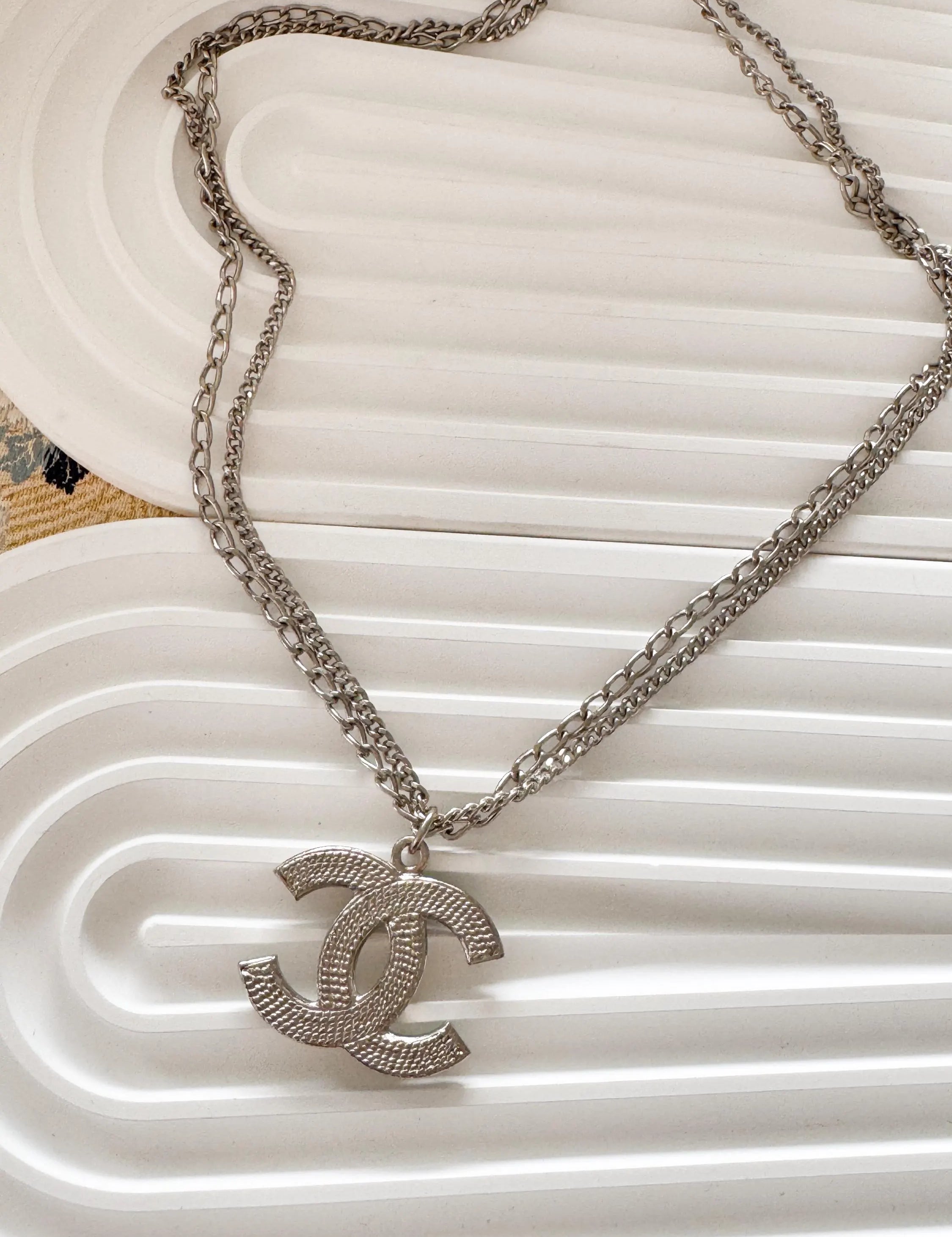 Vintage Chanel silver CC logo necklace, elegant Paris designer jewelry with timeless style