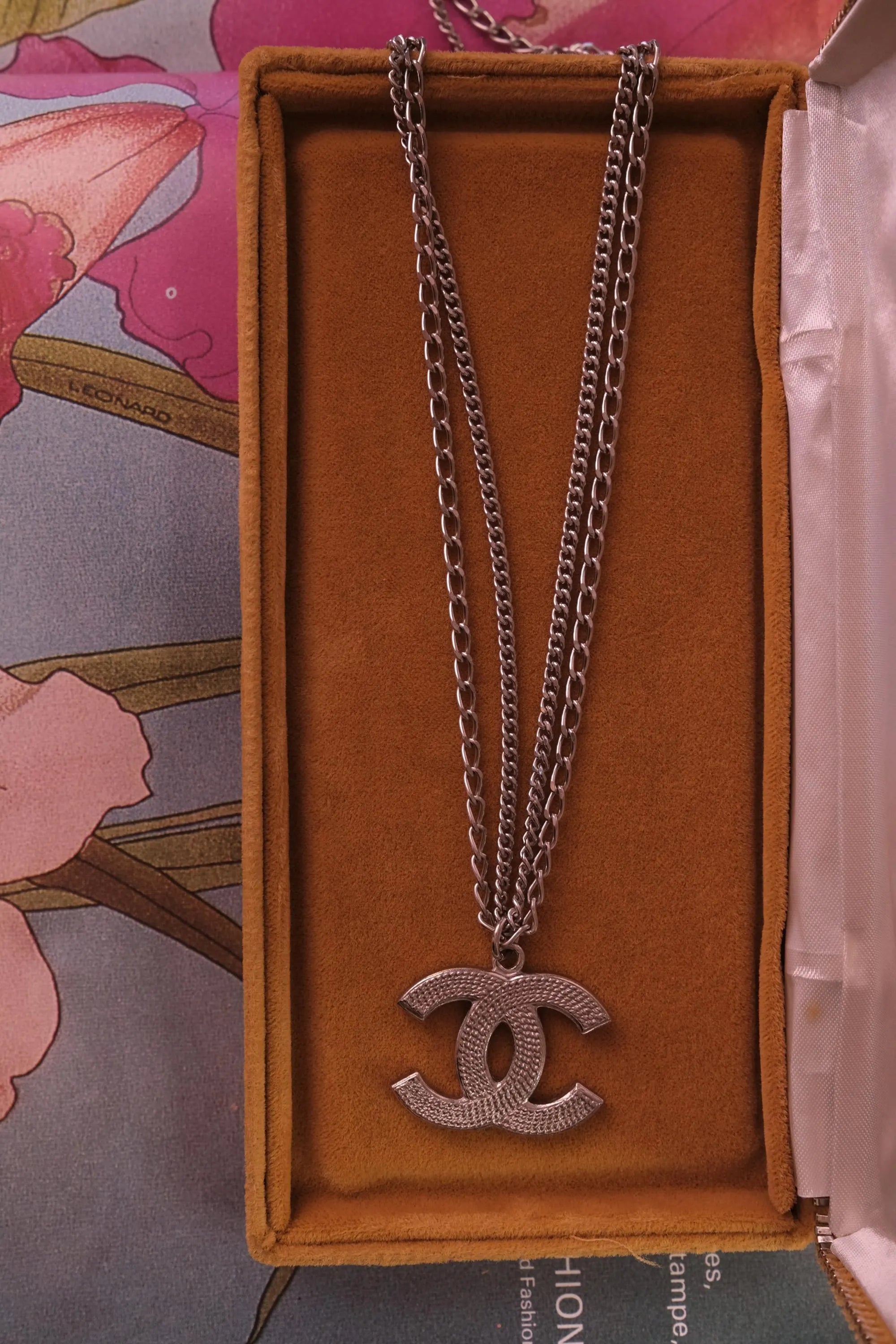 Vintage Chanel silver CC logo necklace, elegant Paris designer jewelry with timeless style