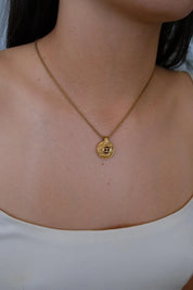 Vintage Christian Dior gold tone CD logo necklace, elegant luxury designer jewelry with timeless Paris style