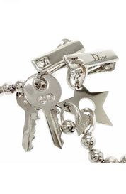Vintage Christian Dior silver-tone star charm clip-on earring detail