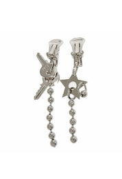 Vintage Dior John Galliano asymmetric star and key earrings detail