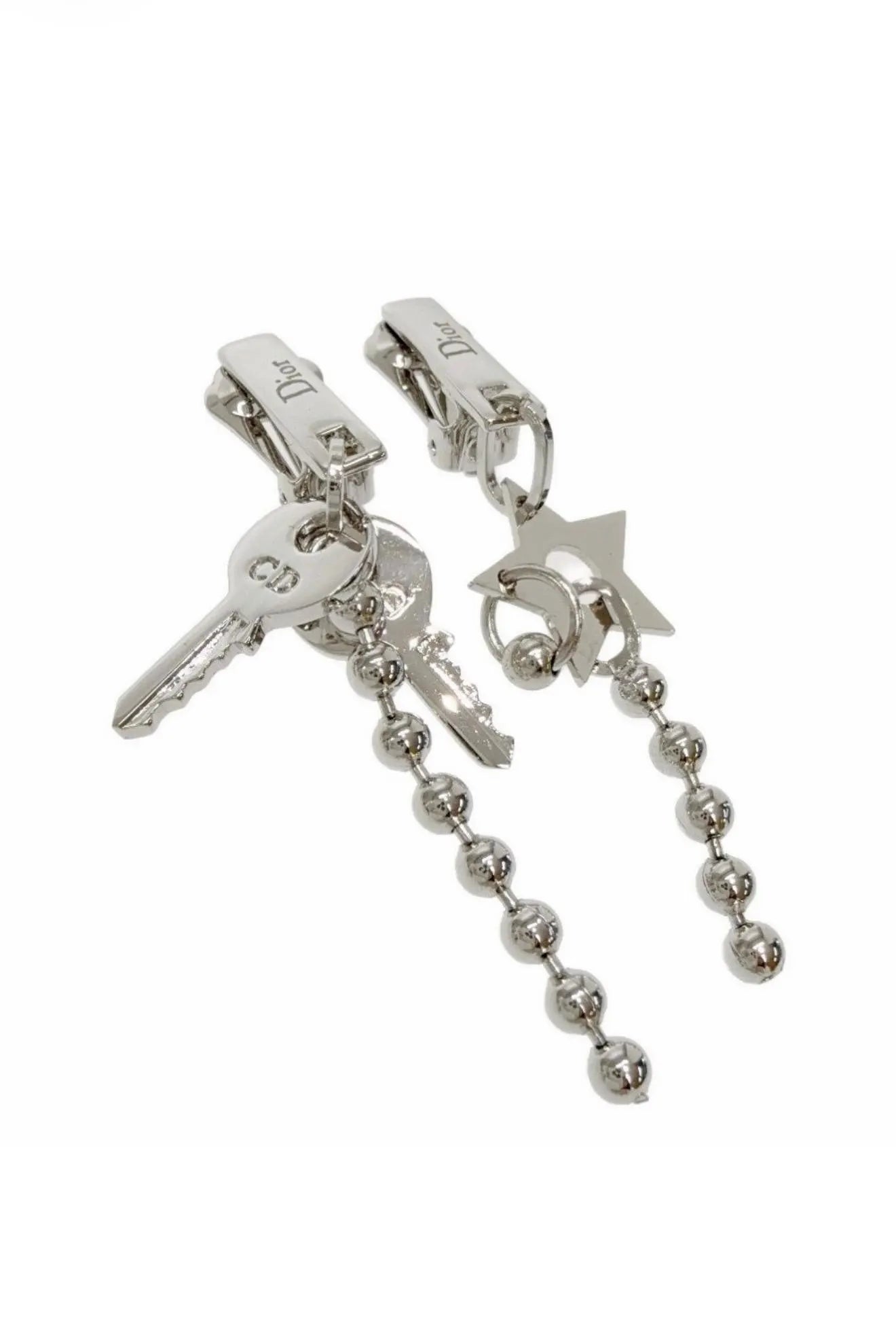 Vintage Dior John Galliano asymmetric star and key earrings detail