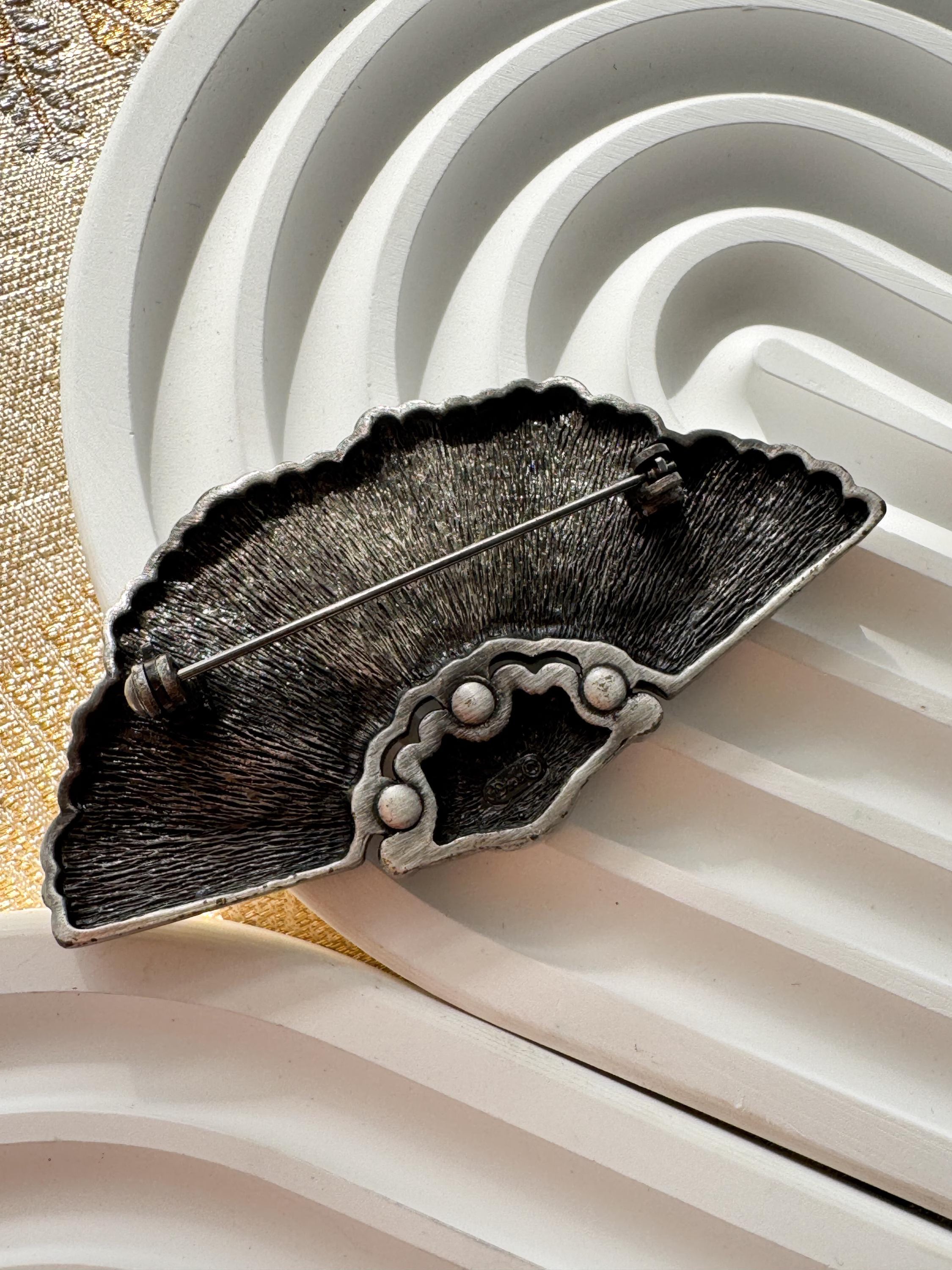 Vintage Christian Dior silver tone fan brooch, timeless continental sophistication