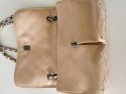 Vintage classic Chanel shoulder bag in caviar beige, made in France, with large front pockets, luxury designer handbag