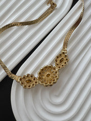 Rare vintage Christian Dior gold plated floral necklace and earrings set, collectible luxury designer jewelry