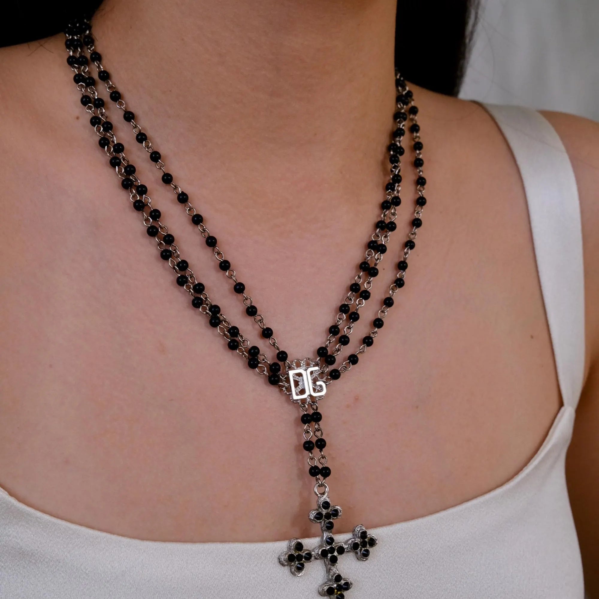 Vintage Dolce & Gabbana black bead cross necklace with silver tone pendant