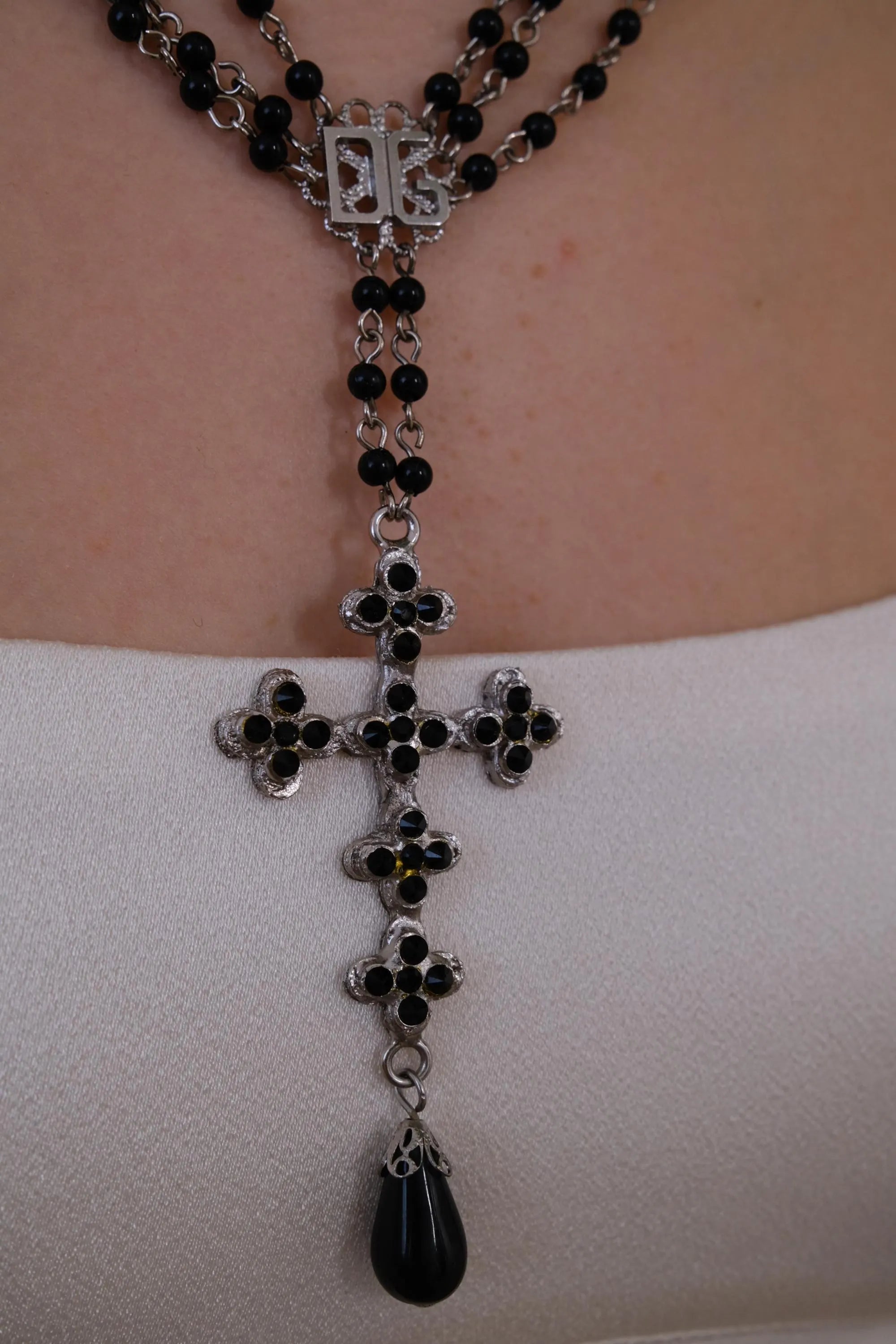 Vintage Dolce & Gabbana black bead cross necklace with silver tone pendant