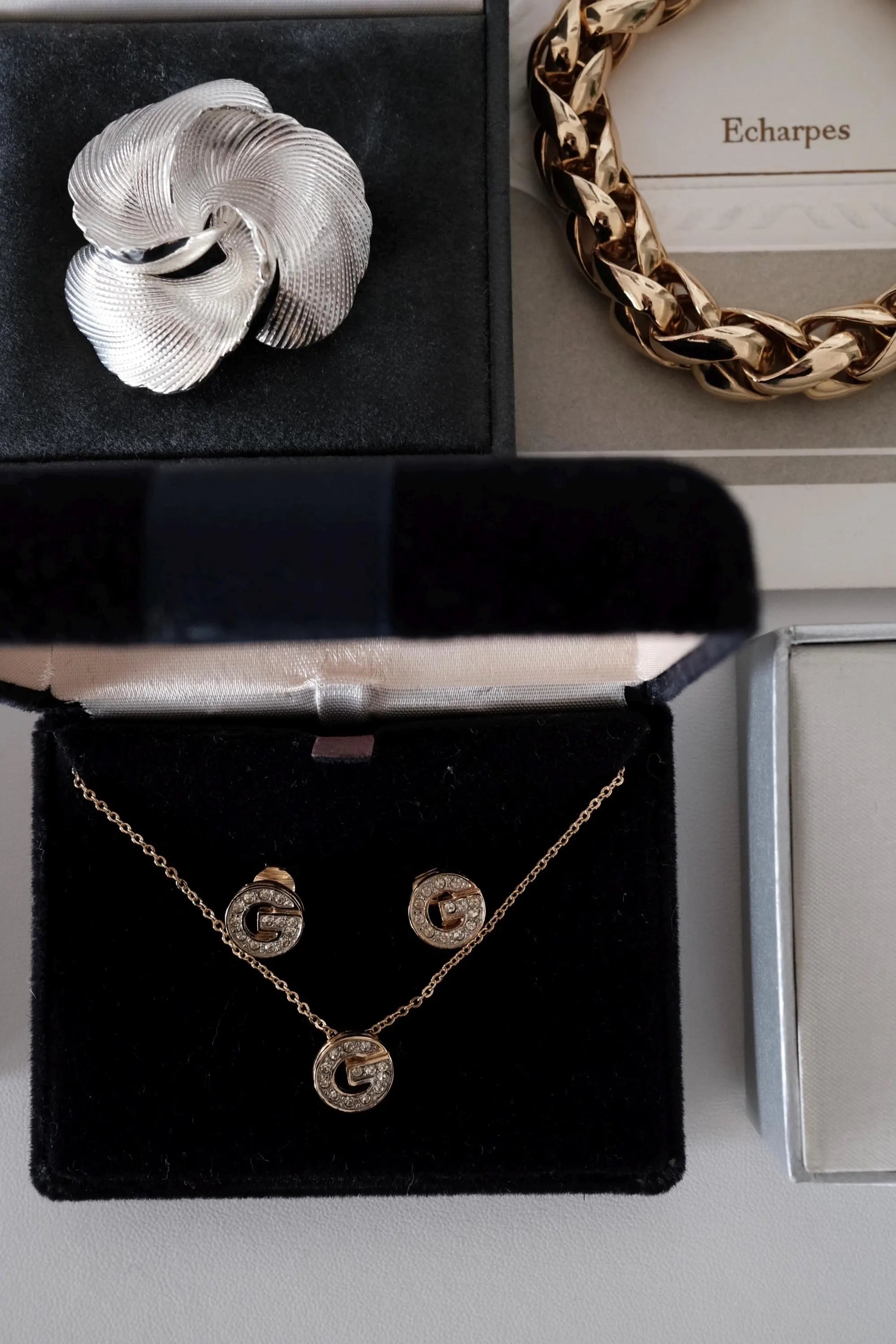 Vintage Givenchy G logo crystal rhinestone necklace and earrings set in gold tone