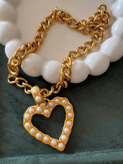 Elegant vintage Givenchy gold plated heart necklace in matte gold, timeless designer jewelry