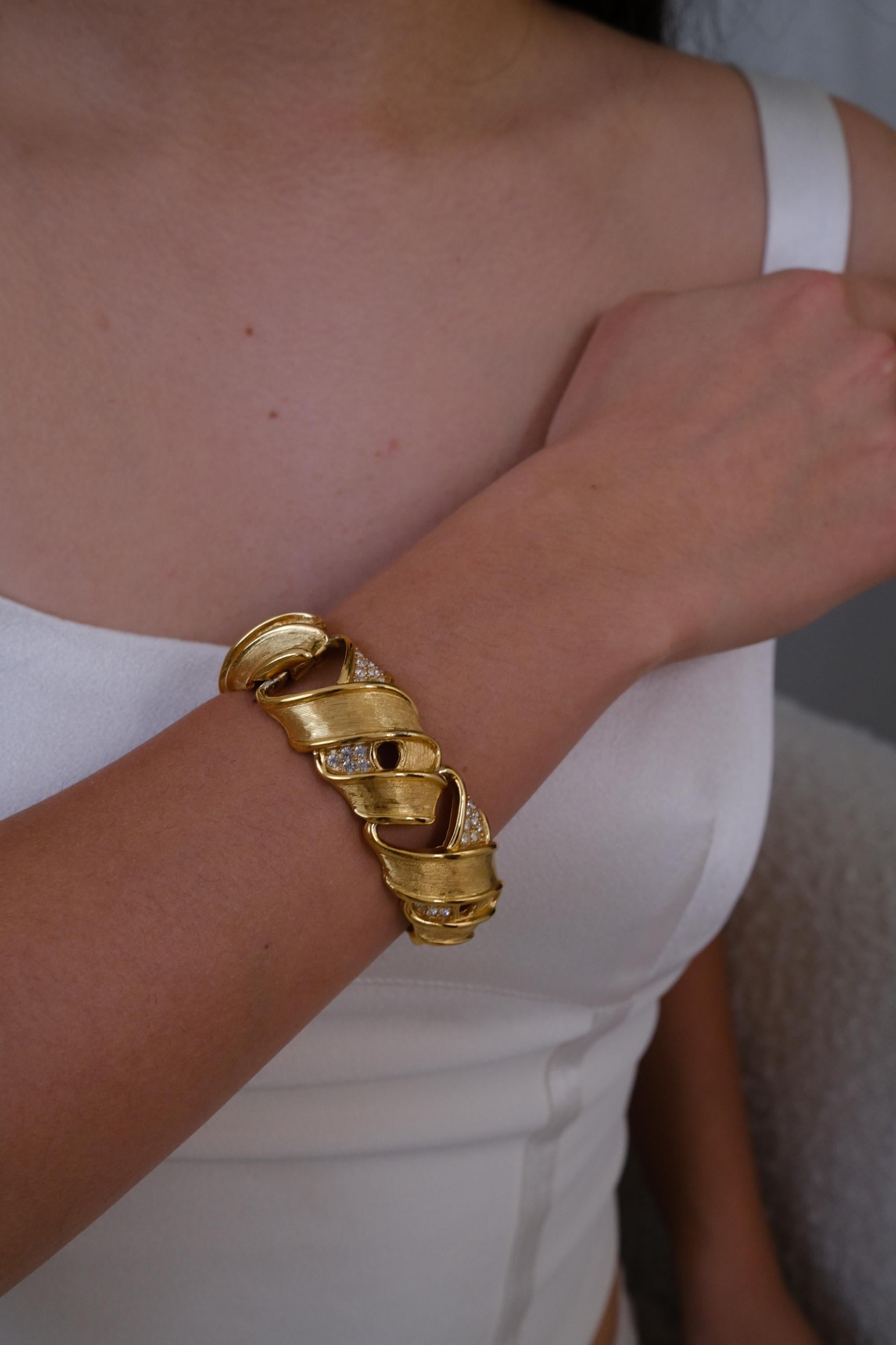 Vintage Givenchy gold sculptural bracelet with bold luxe aesthetic