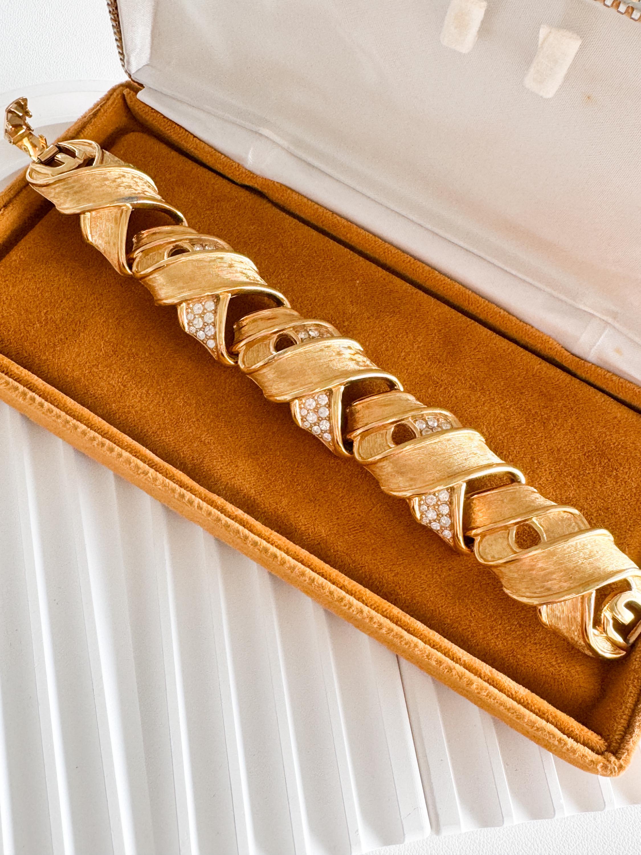 Vintage Givenchy bold gold link bracelet with 90s glam aesthetic