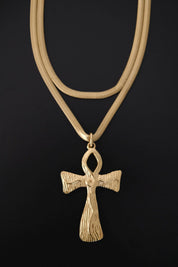 Vintage Givenchy oversized gold-tone cross pendant detail